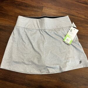 Women’s small tennis skort.  Heather grey.